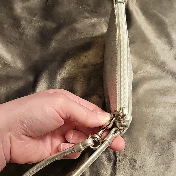 Elegant Coach White and Silver Wristlet